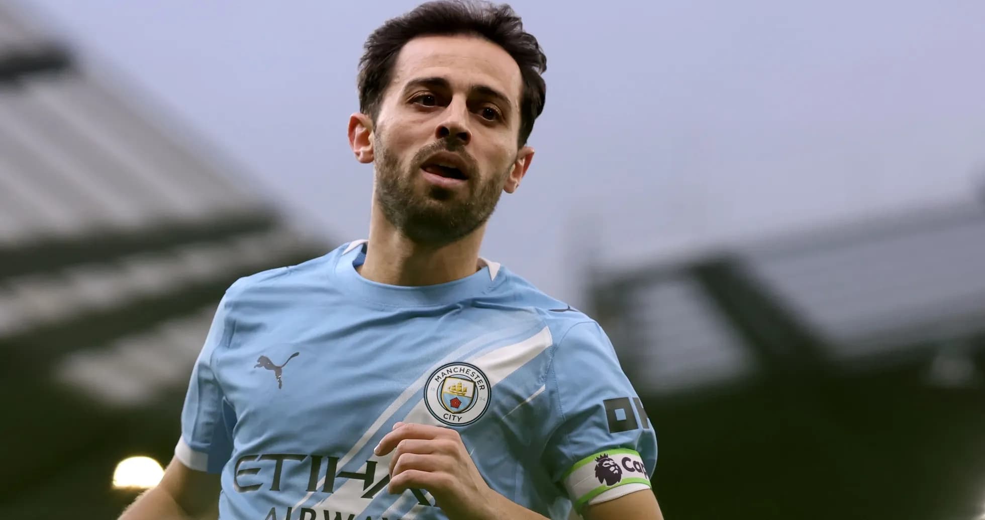 Joueur de Manchester City en action sur le terrain