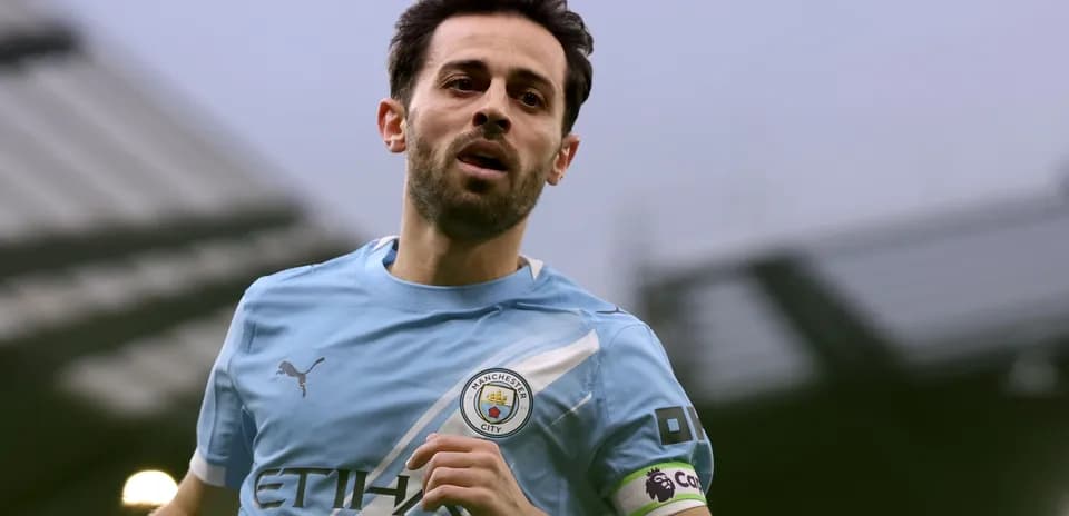 Joueur de Manchester City en action sur le terrain