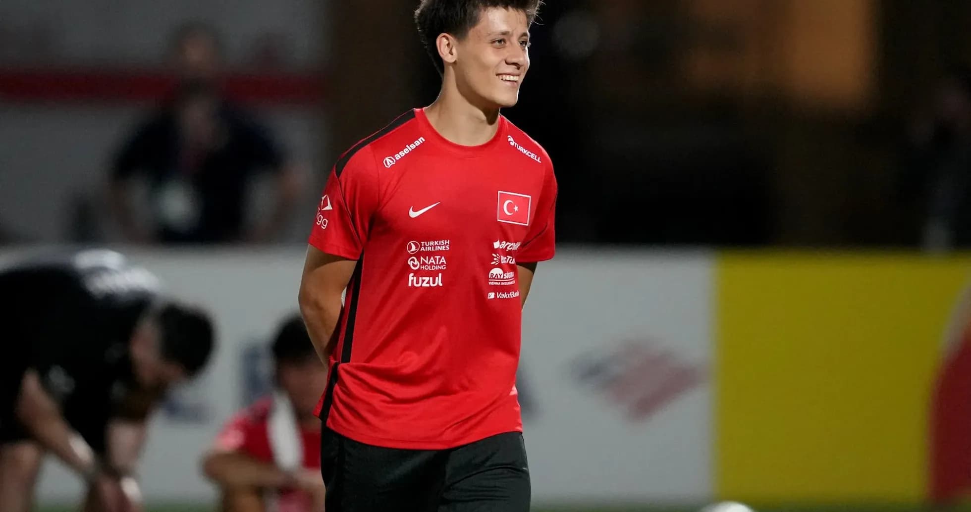 Joueur turc souriant lors de l'entraînement