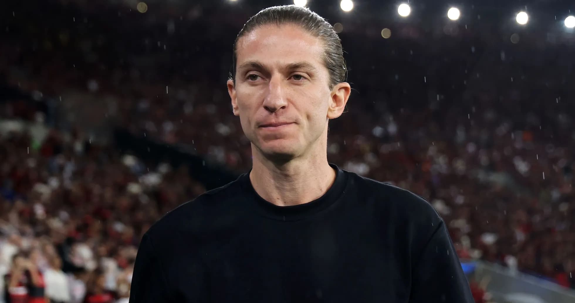 Entraîneur sur le terrain lors d'un match