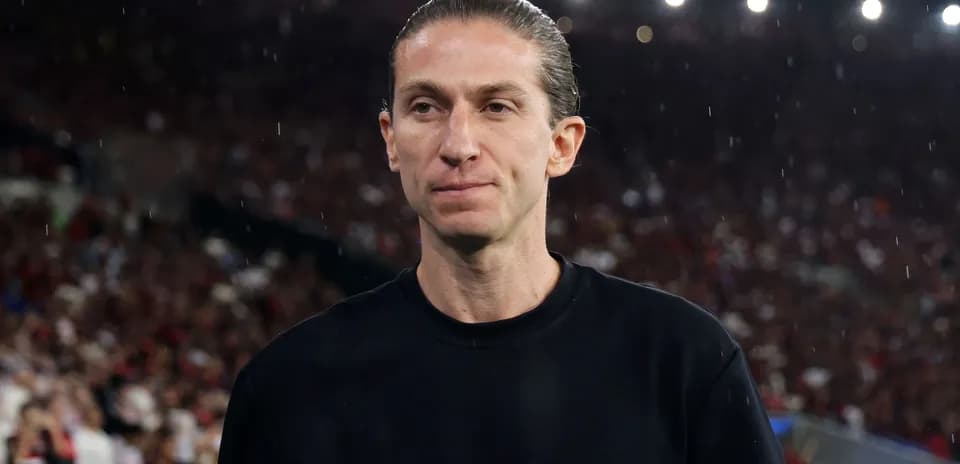 Entraîneur sur le terrain lors d'un match