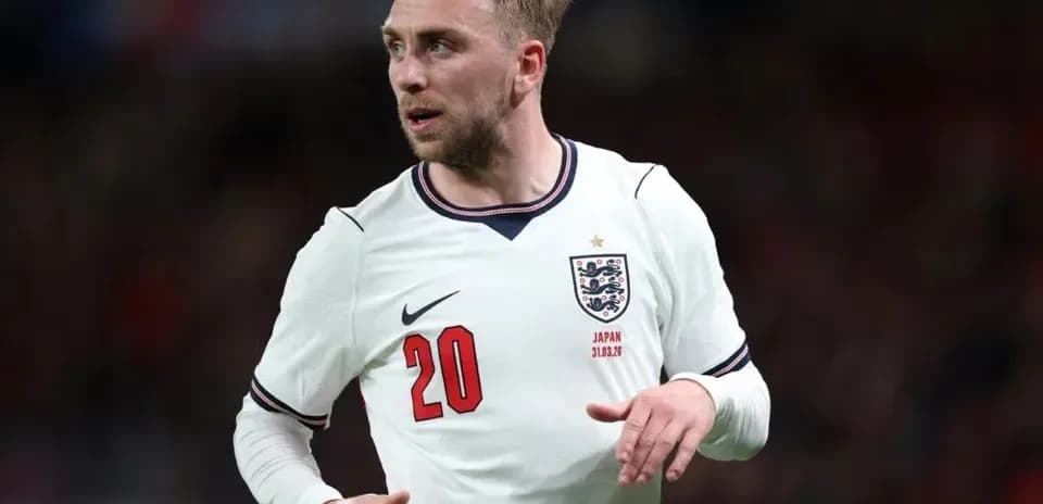 Joueur anglais en action sur le terrain