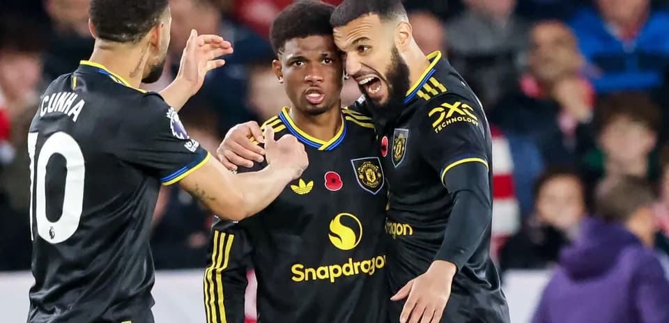 Joueurs de Manchester United célébrant un but