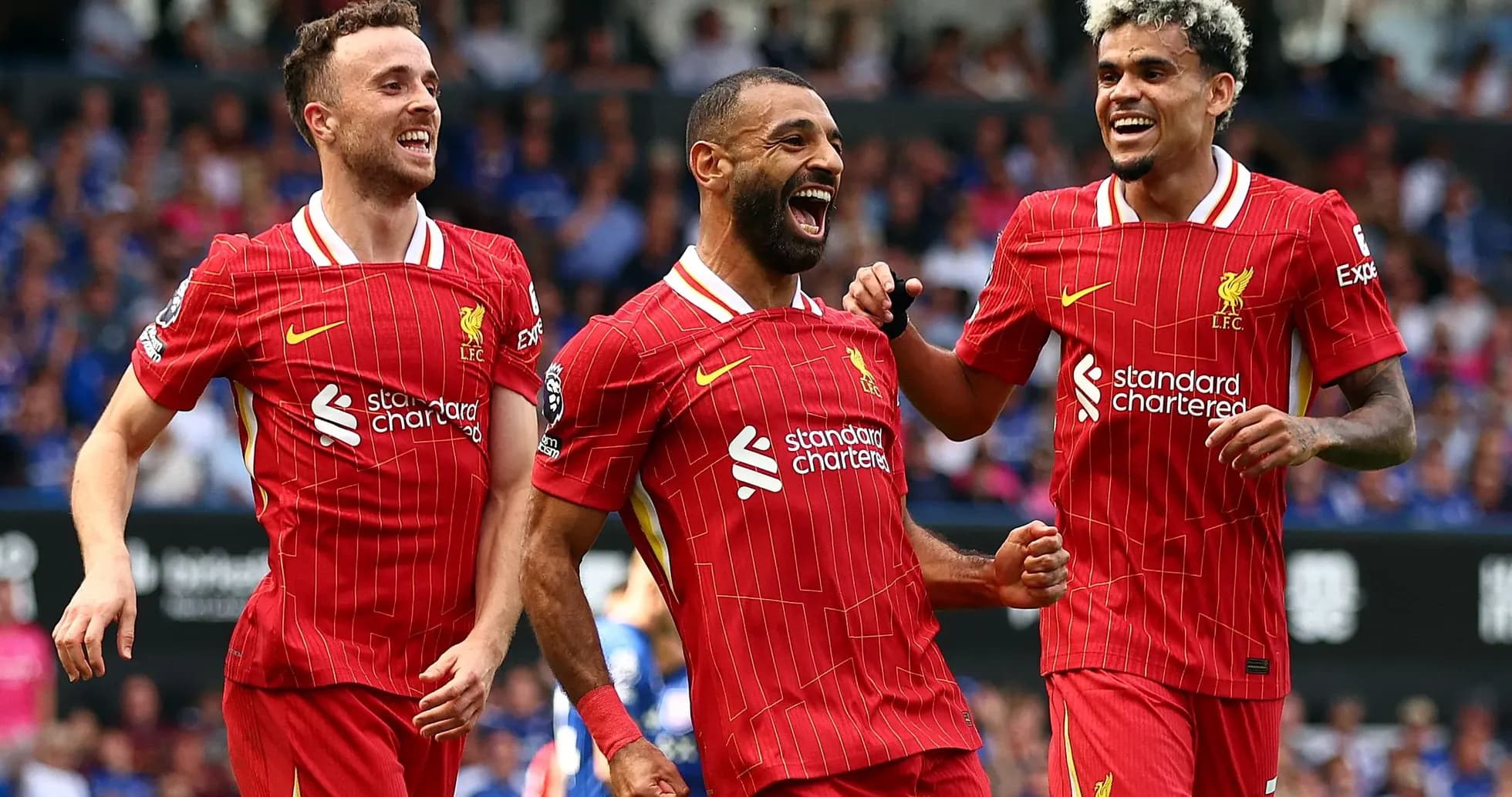 Joueurs de Liverpool célébrant un but