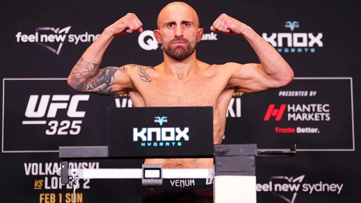Fighter flexing muscles at UFC weigh-in event