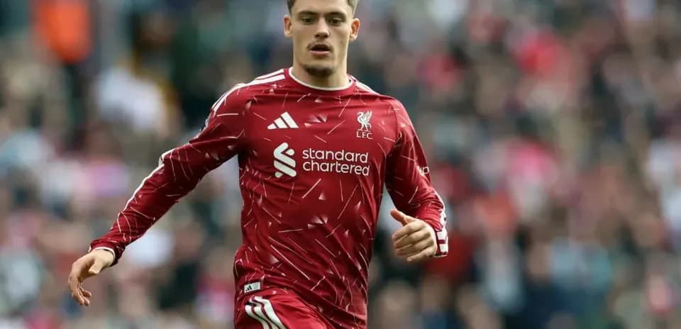 Joueur de Liverpool en action sur le terrain