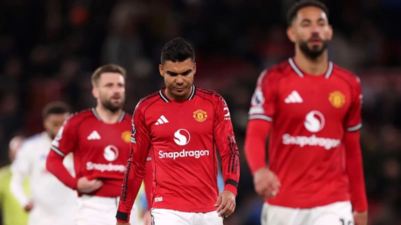 Joueurs de Manchester United quittant le terrain