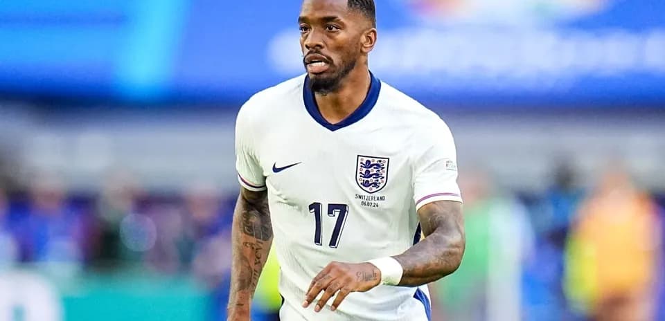 Joueur d'Angleterre en action sur le terrain