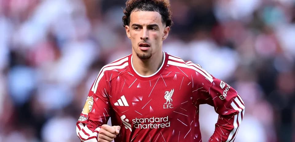 Joueur de Liverpool en action sur le terrain