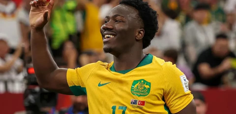 Joueur australien célébrant un but au stade