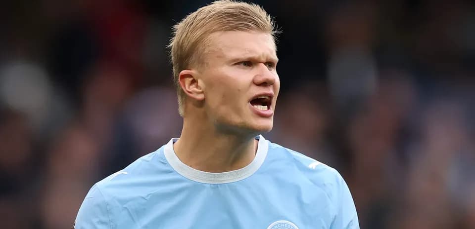 Joueur de Manchester City s'exprimant sur le terrain