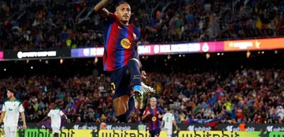Joueur de Barcelone célébrant un but au stade