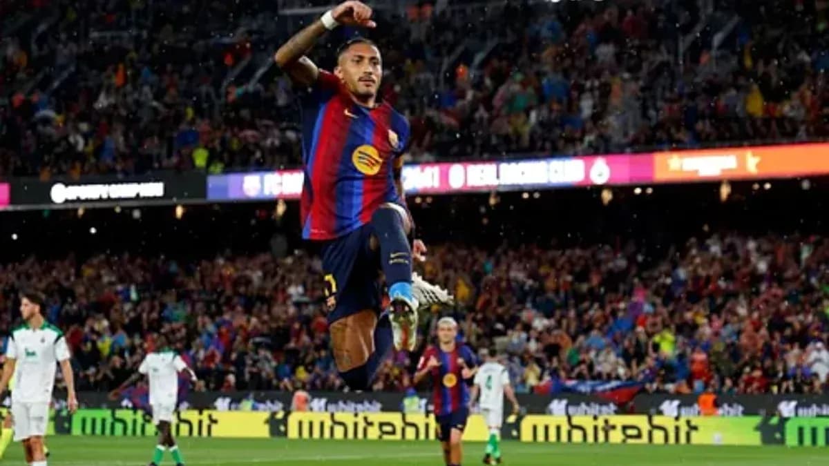 Joueur de Barcelone célébrant un but au stade