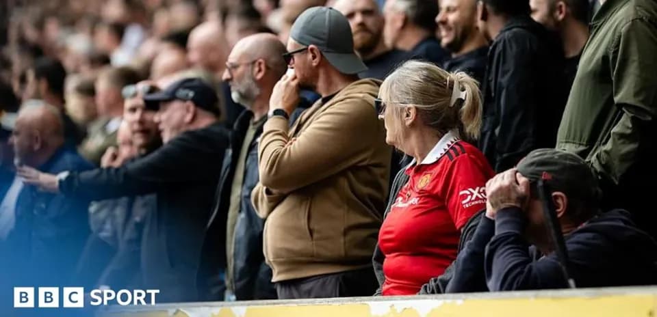 Supporters watching a match in the stands