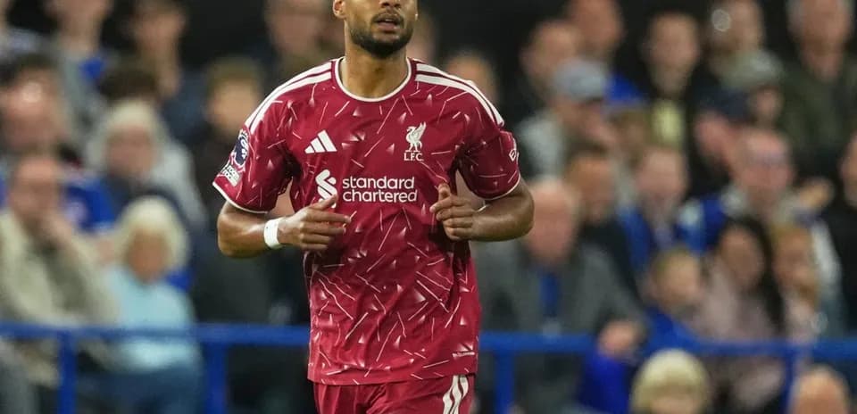 Joueur de Liverpool en action lors d'un match
