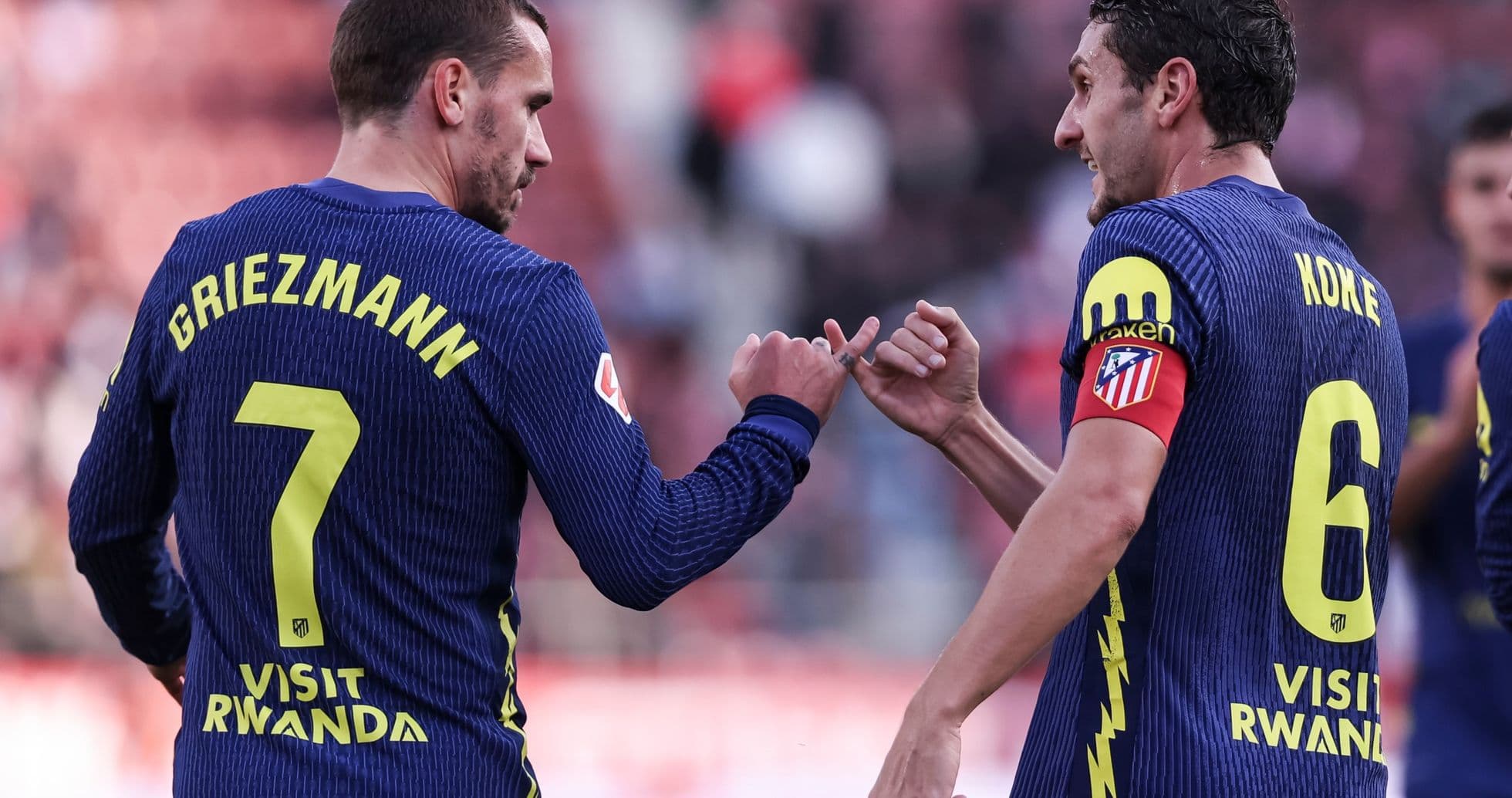 Griezmann et Koke célébrant un moment du match