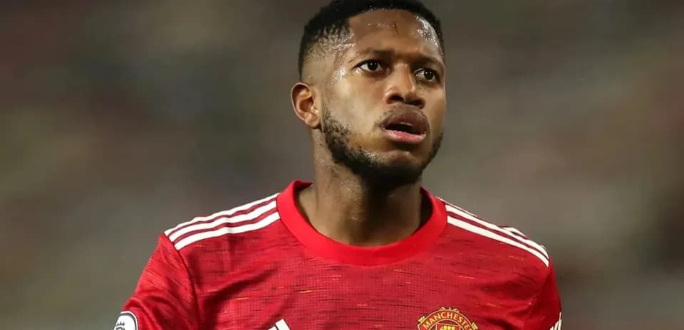 Joueur de Manchester United en maillot rouge