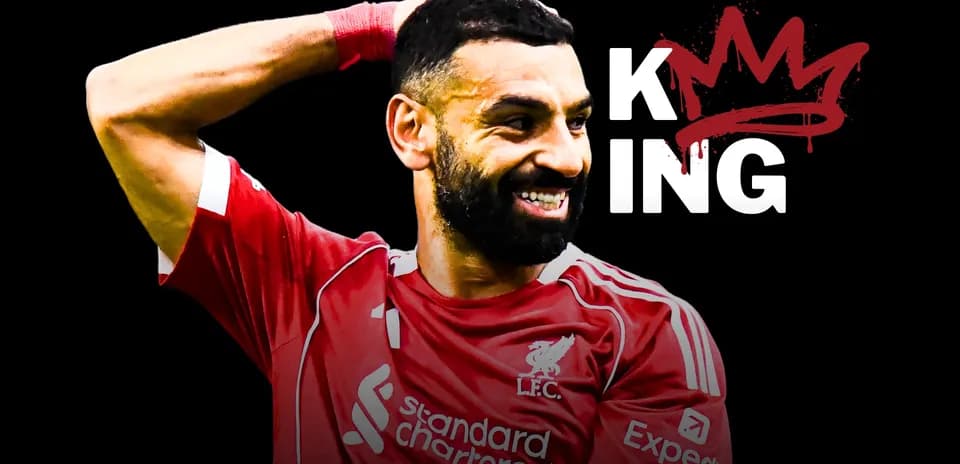 Joueur de Liverpool célébrant avec un sourire