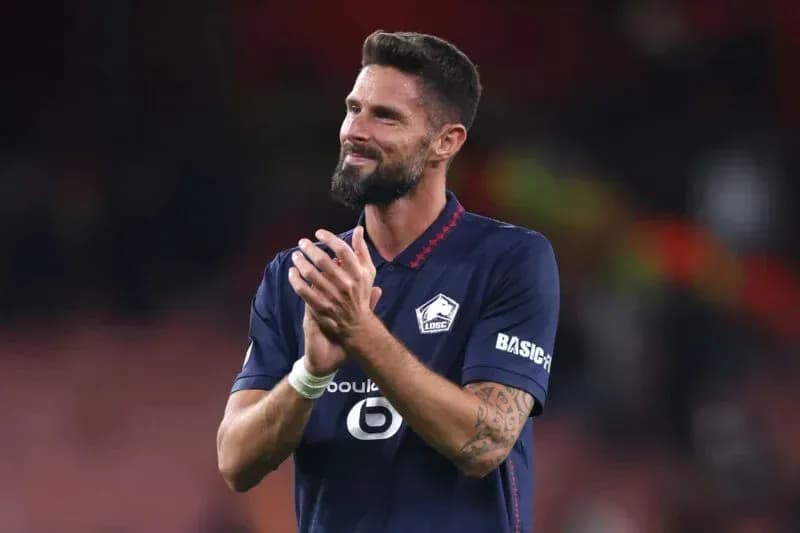 Joueur applaudissant après un match au stade