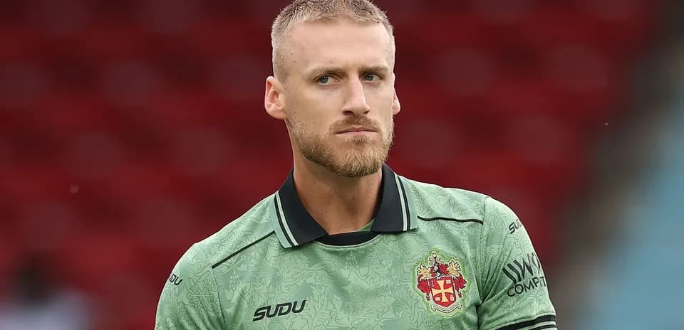 Gardien de but en tenue d'échauffement avant le match