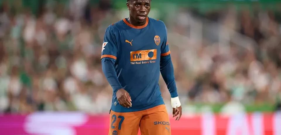 Joueur de Valence en action sur le terrain