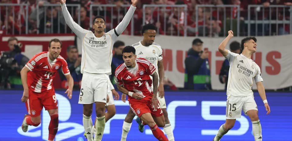 Joueurs de Bayern et Real Madrid en action