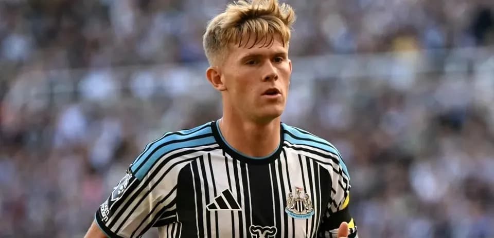 Joueur de Newcastle en action sur le terrain