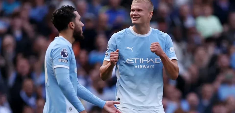 Joueurs de Manchester City célébrant un but