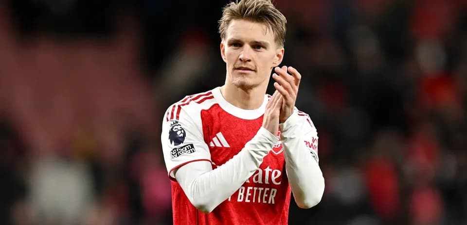 Joueur applaudissant après un match avec Arsenal
