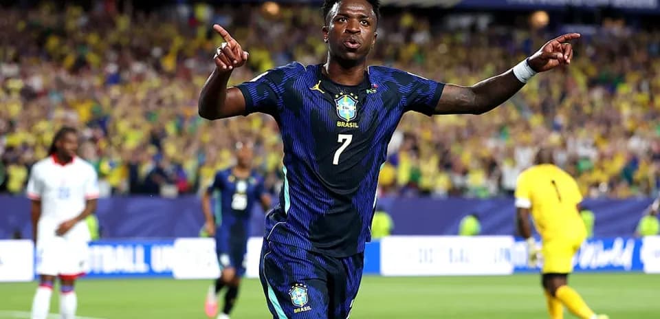 Joueur brésilien célébrant un but lors d'un match