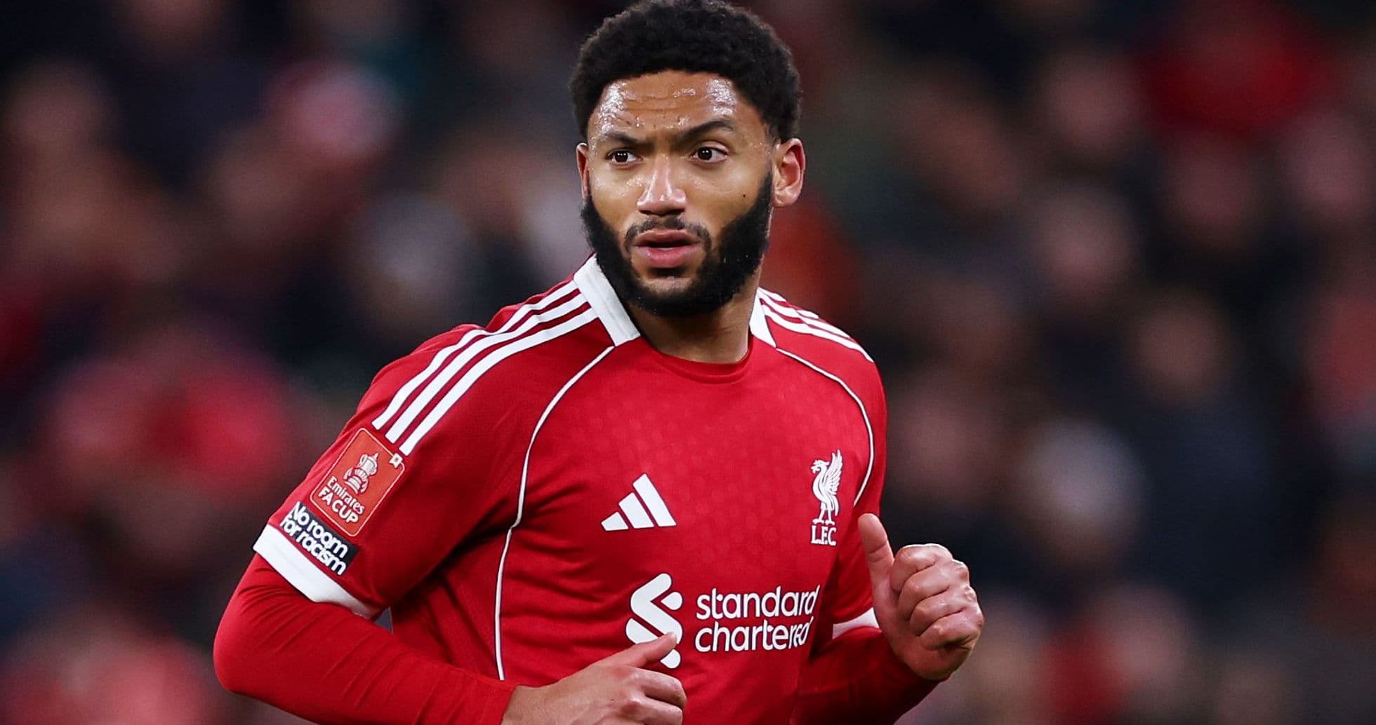 Joueur de Liverpool en action sur le terrain