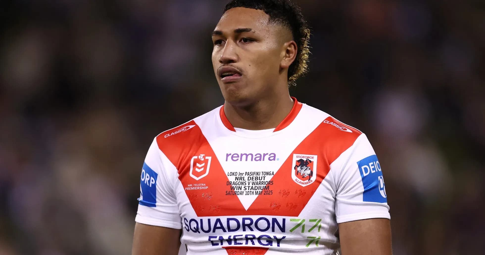 Joueur en maillot des Dragons pendant un match