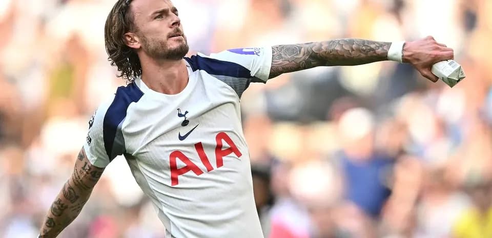 Joueur de Tottenham célébrant un but lors d'un match