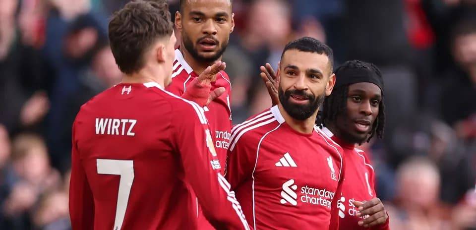 Joueurs de Liverpool célébrant un but