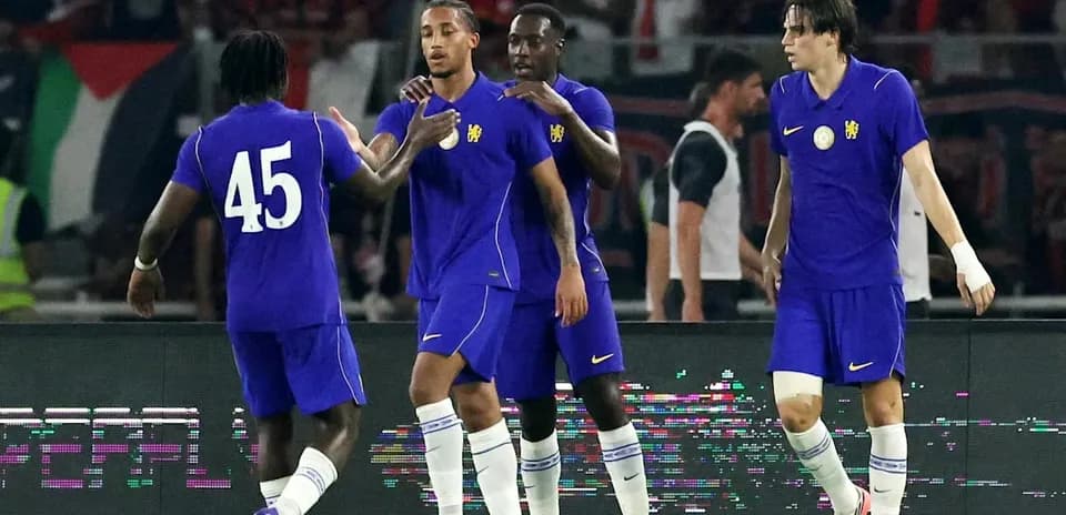 Joueurs célébrant un but lors d'un match