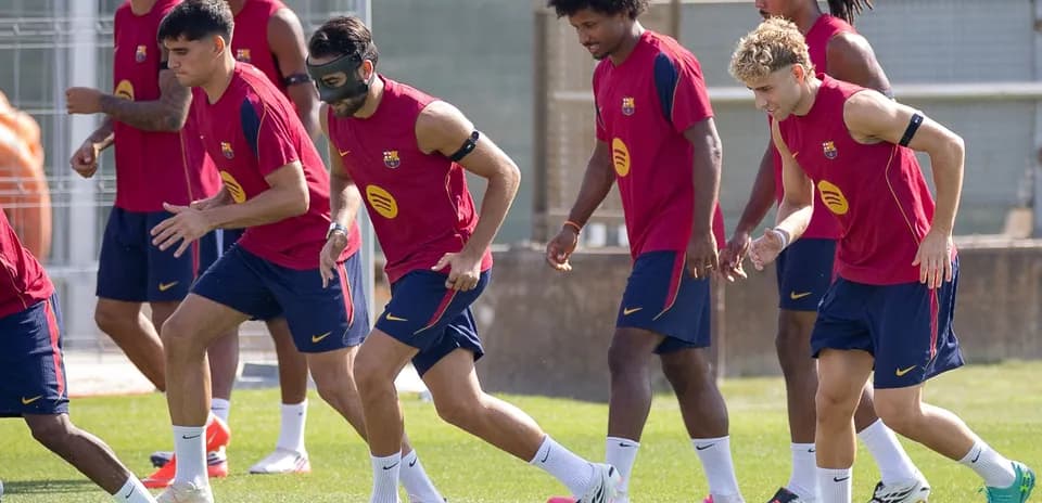 Joueurs du FC Barcelone s'entraînant sur le terrain