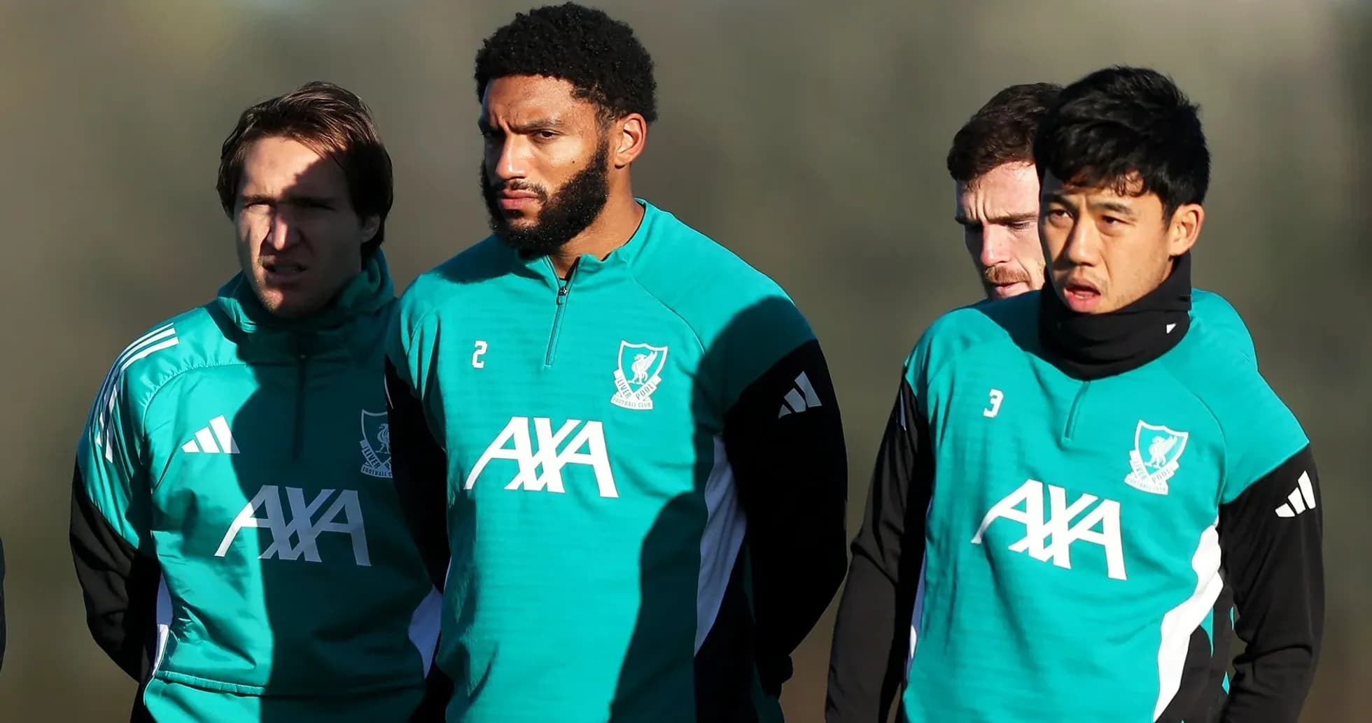 Joueurs de Liverpool en entraînement sur le terrain