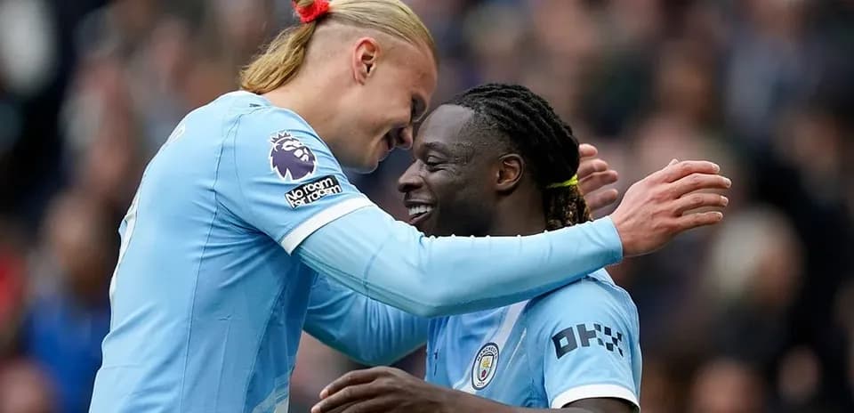 Joueurs de Manchester City célébrant un but