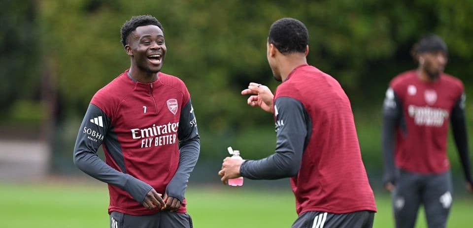 Joueurs d'Arsenal riant lors d'une séance d'entraînement