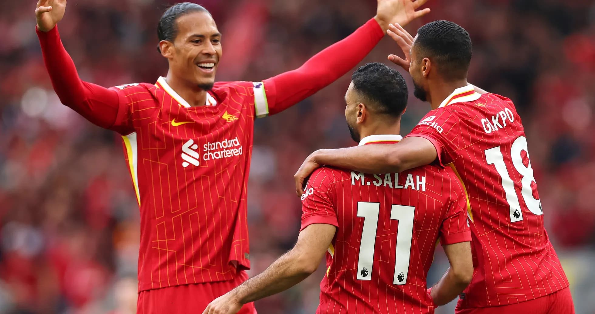 Joueurs de Liverpool célébrant un but
