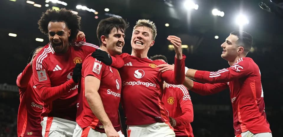 Joueurs de Manchester United célébrant un but