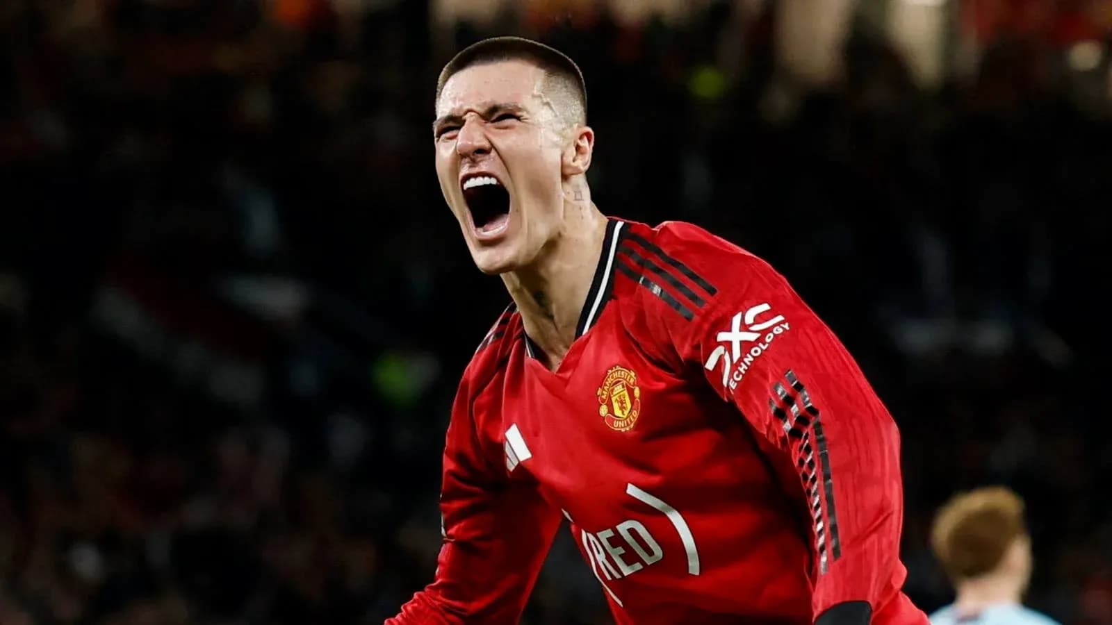 Joueur de Manchester United célébrant un but