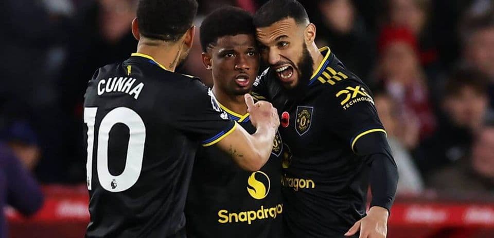 Joueurs de Manchester United célébrant un but