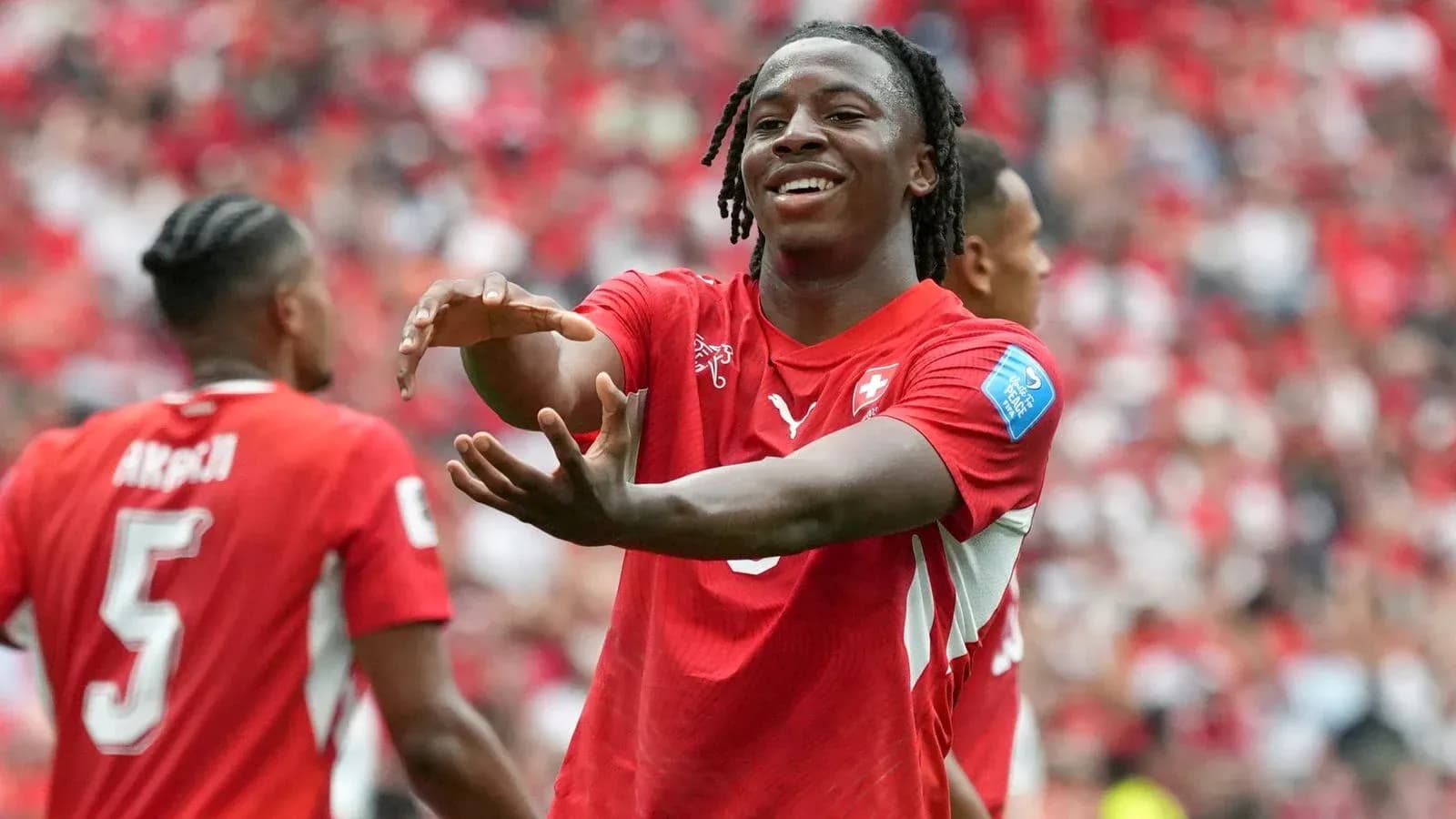 Joueur suisse célébrant avec ses coéquipiers