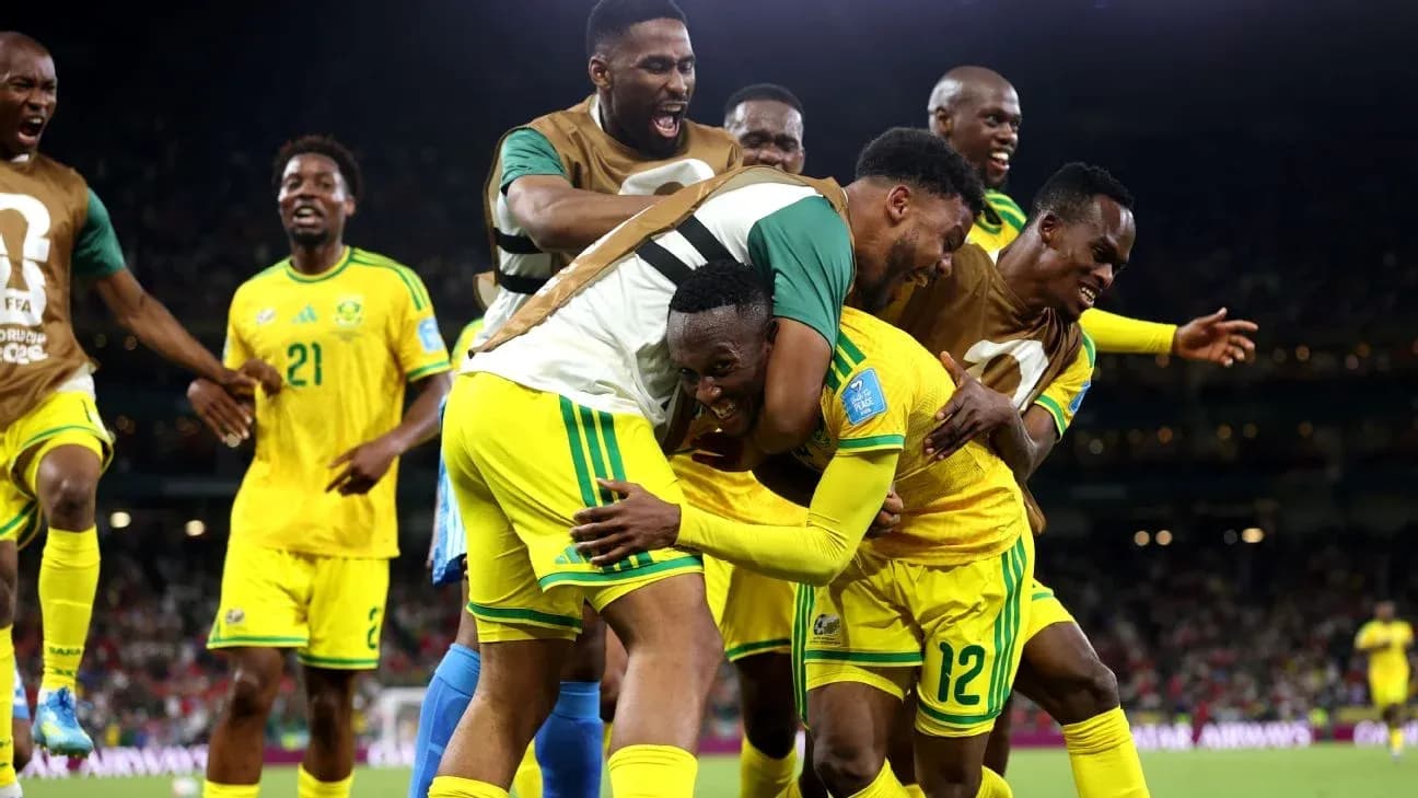 Joueurs sud-africains célébrant un but ensemble