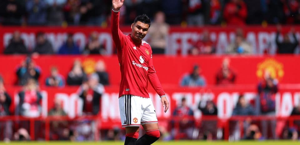 Joueur saluant les supporters à Old Trafford
