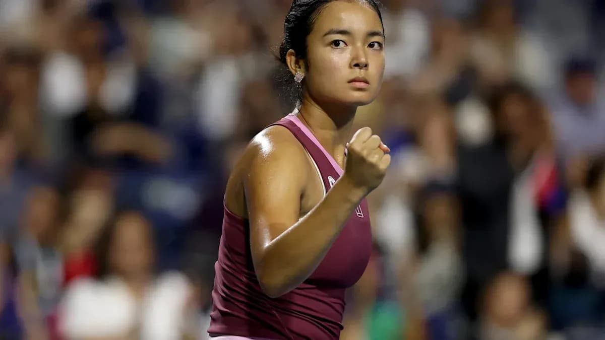 Joueuse de tennis célébrant un point gagné