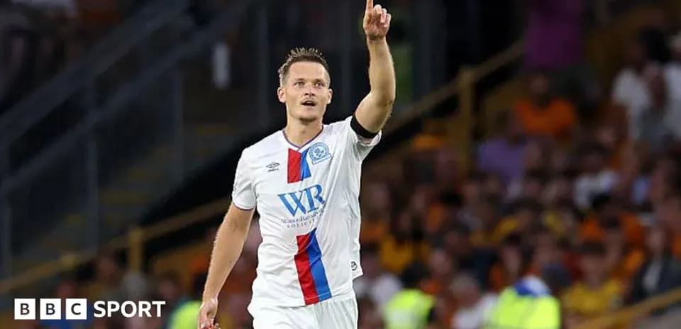 Joueur célébrant un but lors d'un match
