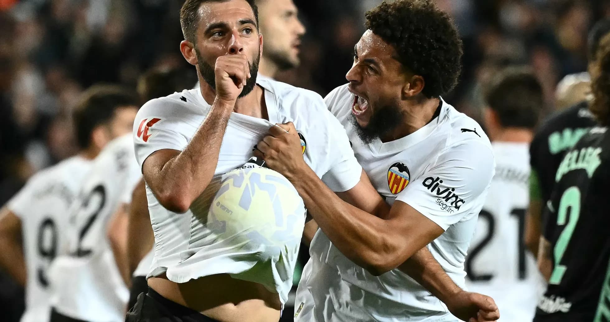 Joueurs de Valence célébrant un but