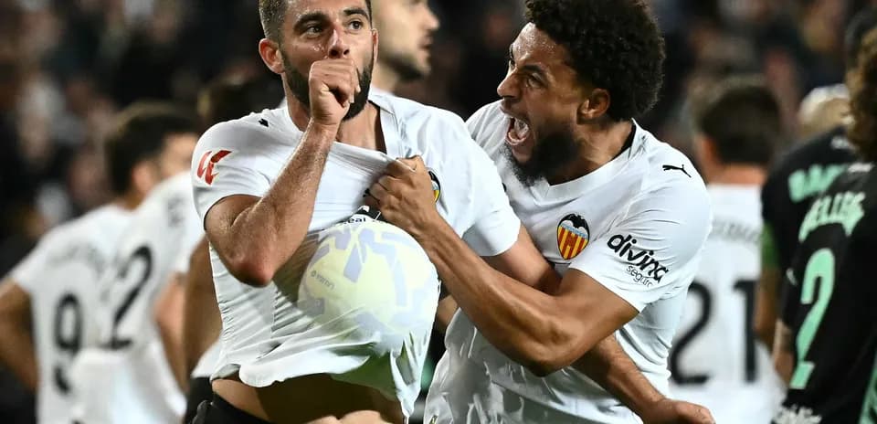 Joueurs de Valence célébrant un but